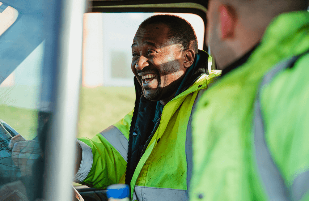 binmen wearing hi vis jackets